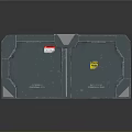 Heavy Duty Dark Metallic Gate With Geometric Panels Yellow Warning Labels And Textured Surface