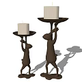 Brown Reindeer Shaped Decorative Candle Holders With White Candles And Tray