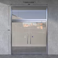 Modern Glass Double Doors With Metal Frame Showing Urban View At Building Entrance