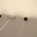 Light Colored Wall With Mounted Black And Silver Hooks And White Cables Extending Downward 3d model
