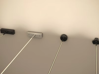 Light Colored Wall With Mounted Black And Silver Hooks And White Cables Extending Downward 3d model
