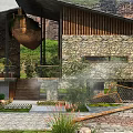 Rustic Modern Boutique Guesthouse With Stone Walls Wooden Structure And Sloped Roof Courtyard Greenery