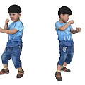 Two Young Boys In Blue T Shirts And Jeans Doing Boxing Poses