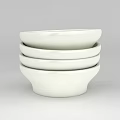 Tech Exhibition Hall Showcasing Stacked White Bowls With Contemporary Design