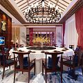 Chinese Style Clubhouse Interior With Mahogany Furniture Red Walls Chandelier And Circular Decor