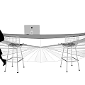 Modern Reception Desk With Apple iMac Wire Mesh Chairs And Person Walking By