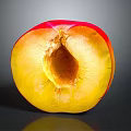 Fresh Halved Peach Showing Juicy Yellow Flesh And Red Skin