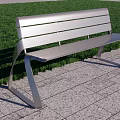 Silver Metal Outdoor Chair With Modern Design On Tiled Ground And Grass Background