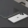 Sleek Apple Smartphones In Gray And White With Four Camera Lenses On Table