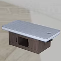 Gray Mattress Massage Bed With Blue Trim Dark Wood Storage Cabinet And Round Hole