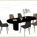 Modern Minimalist Dark Oval Dining Table Set With Stylish Upholstered Chairs And Exquisite Tabletop Decorations