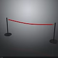 Red Rope Barrier With Black Stanchions And Round Bases On Gray Background