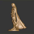 Shiny Golden Male Statue in Detailed Armor With Flowing Cloak Standing on Pedestal