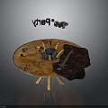 Round Wooden Party Table With Floating Party Letters Cups Sword And Fur Pelt Decor