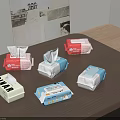 Red Blue White Tissue Boxes With Baby SINAR Labels On Wooden Table