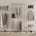 Modern Clothes Racks with Hanging Clothes Bags and Shoes in Minimalist Bedroom Storage Setup