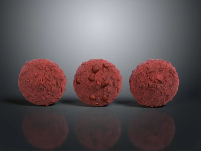 Three Delicious Red Food Balls with Textured Surface and Nutty Bits 3d model