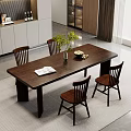 Dark Wooden Dining Table Set With Four Chairs Open Book Green Plant And Fruit Bowl