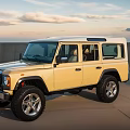 Yellow Classic Off Road Vehicle With White Roof Parked On Open Ground Under Sky