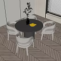 Modern Round Dining Table Set with Four Chairs Vase Lemons on Sunlit Wooden Floor