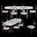 Modern Dining Table Set With Marble Tabletop Black Legs Curved Backrest Chairs And Patterned Cushions