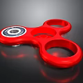 Red Fidget Spinner With Three Circular Rings And Central Bearing For Daily Use