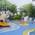 Outdoor Kids Playground With Tiger Shaped Climbing Slide Blue Play Surface And Green Trees
