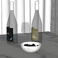 Kitchen Countertop With White Marble Wine Bottles Wine Glass Silver Bowl And Black Olives