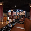 Elegant Modern Restaurant Interior With Leather Seats Wooden Tables And Wine Racks