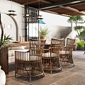 Elegant Reception Room With Wicker Chairs Wooden Furniture And Green Plants Pendant Lights