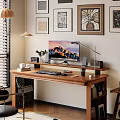Wooden Office Desk With Mountain View Monitor Desk Lamp Potted Plant And Decorative Wall Art