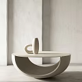 Modern Minimalist Coffee Table With Curved Design And Decorative Vase In Neutral Color
