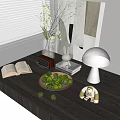Stylish Decorative Ornament Set With Open Book Vase Rabbit Lamp And Limes On Wooden Table
