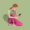Red Haired Woman In Colorful Top And Purple Leggings Sitting On Brick Pavement Using Smartphone