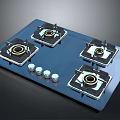 Modern Four Burner Gas Stove With Blue Glass Surface And Control Knobs