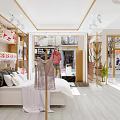 Bright Modern Ladies Clothing Store Interior With Elegant Gold Display Racks And Comfortable Shopping Space