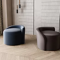 Modern Round Blue and Brown Upholstered Stools on Herringbone Wooden Floor with Striped Walls Curtains