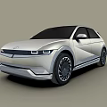 Silver Electric Crossover Car With Sleek Body LED Headlights And Alloy Wheels