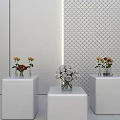 Hanging Basket Plants Decor With White Pedestals Vases Flowers And Diamond Pattern Wall Backdrop