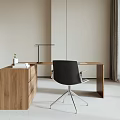 Modern Wooden Desk Interior With Black Chair Table Lamp Books And Small Plant