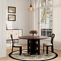 Round Wooden Table And Two Black Chairs with White Cushions and Flower Vase by Window