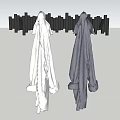 Wall Mounted Hooks Hanging White and Gray Clothes on Gray Wall