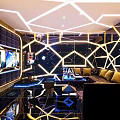 Modern KTV Interior Design With Geometric Lighting LED Screens And Sofa 3d model