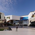 Modern Commercial Complex Architecture With Glass Curtain Walls Entrance Plaza And Open Space