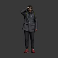 A Man With Hand Over Eyes In Gray Jacket Green Backpack And Red Shoes