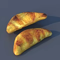 Two Golden Brown Baked Pastries With Half Moon Shape And Crispy Crust