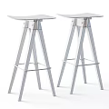 Modern Three Legged Bar Stools With Metal Footrest In Light And Dark Wood Tones