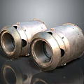 Two Metallic Cylindrical Industrial Components With Holes And Reflective Surface