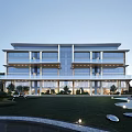 Modern Multi Storey Residential Building With Glass Curtain Walls And Landscaped Gardens