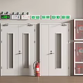 White Swing Doors With Narrow Glass Panels And Green Safety Signs Near Red Fire Extinguisher